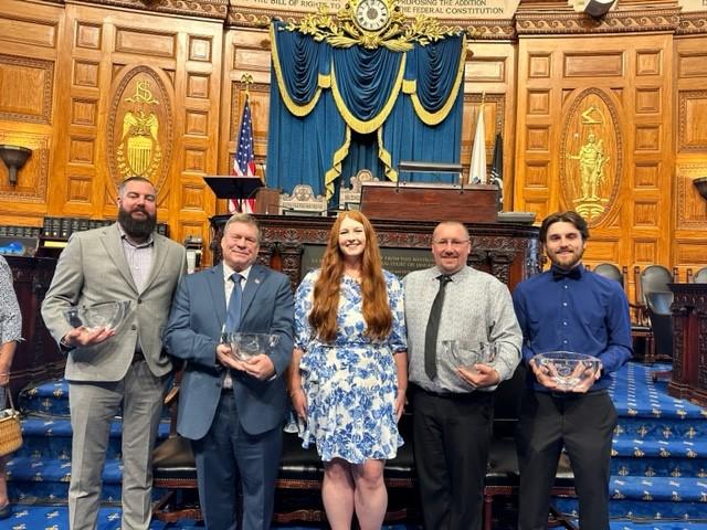 Anna Sweeney and the four Civilian Bravery award recipients 