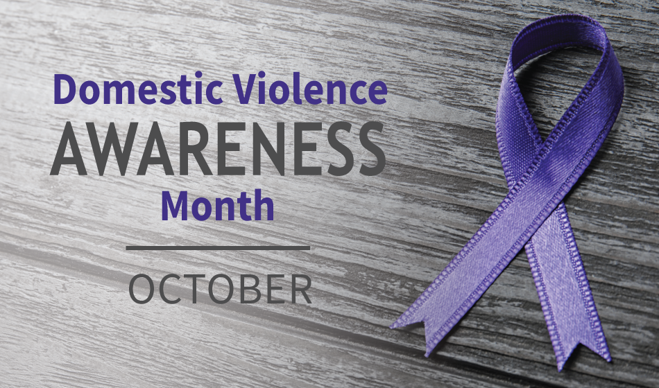 Purple domestic violence awareness ribbon on a wood background with text that says "Domestic Violence Awareness Month, October"