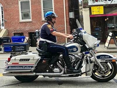 Brookline PO on motorcycle