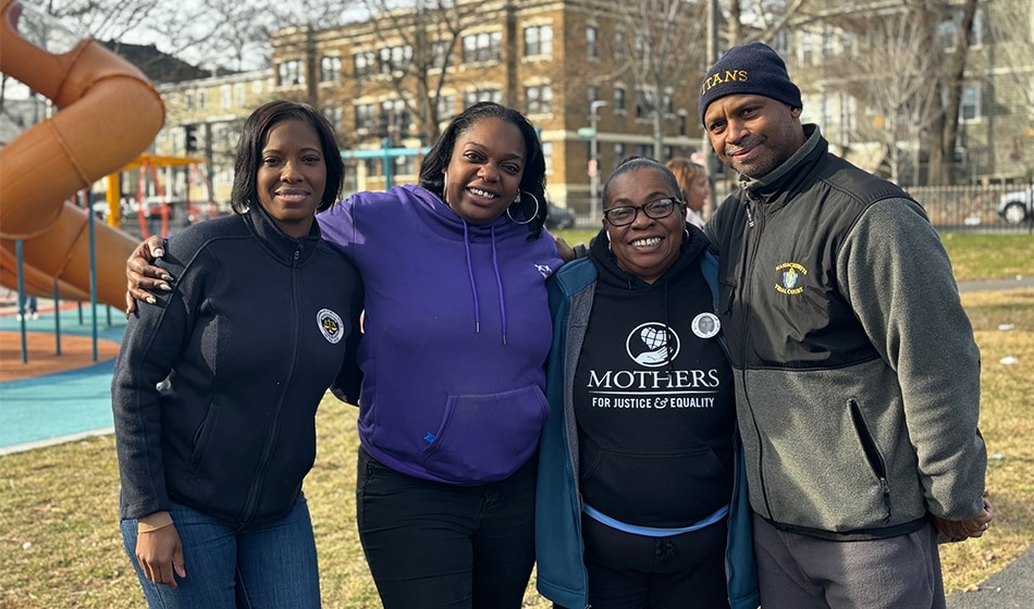 Suffolk Superior Probation Officer Ellen Winfrey; Nikia Shell, Stronger Communities Program Coordinator for Mothers for Justice; Aretha Mauge, Outreach Coordinator for Mothers for Justice; and Suffolk Superior Probation Officer Maurice Greaves outside at ceremony.