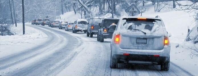 vehicles driving on snow and ice