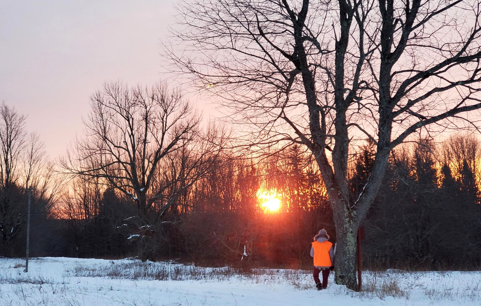 person recreating outside during winter sun