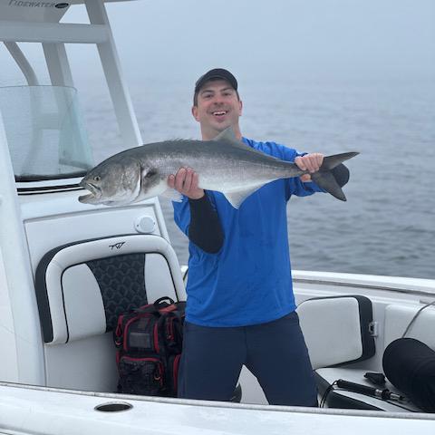 Mike Pieropan with a 39 inch bluefish, one of the many Saltwater Fishing Derby winners. 
