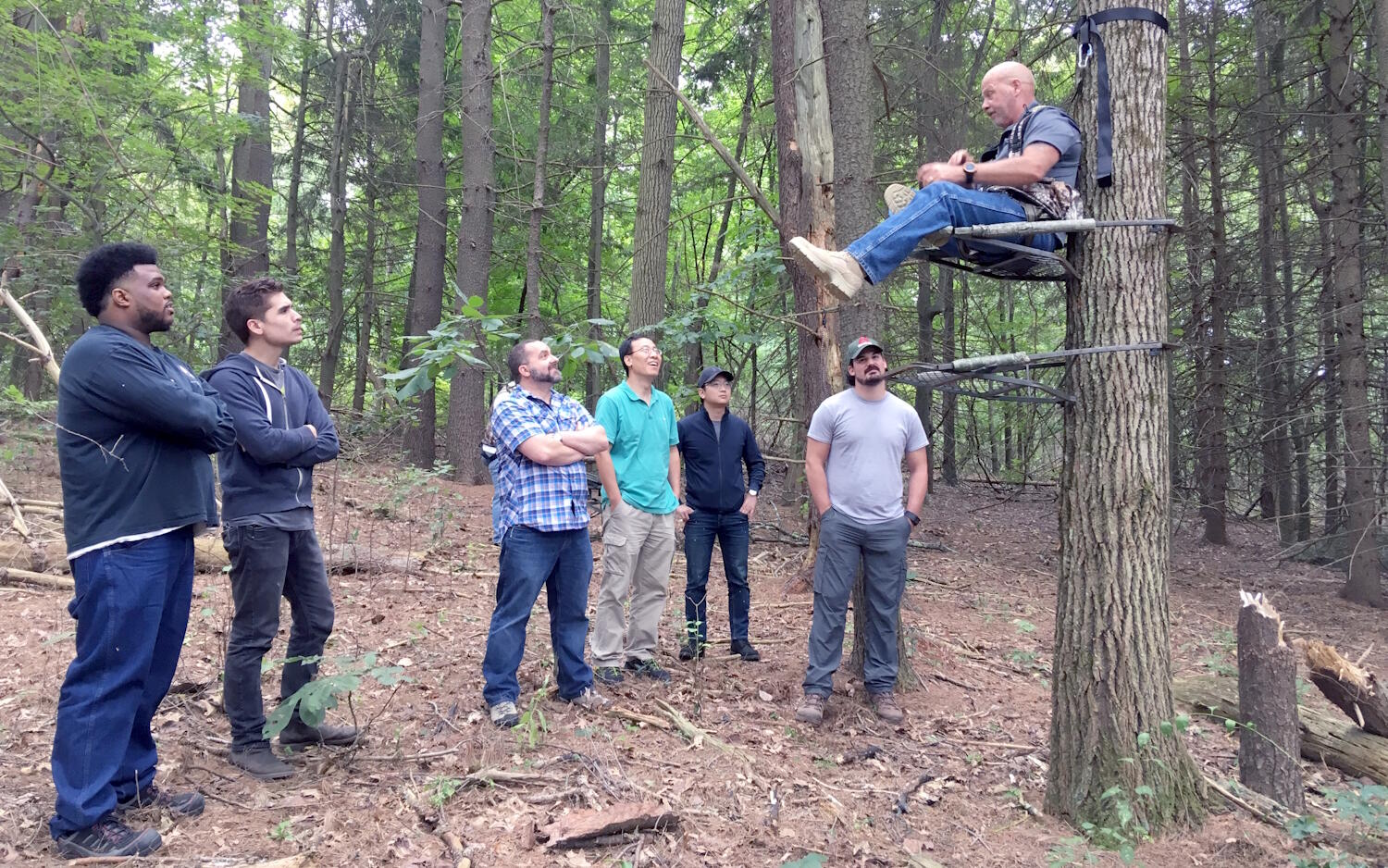 volunteer instructor teaching tree stand safety