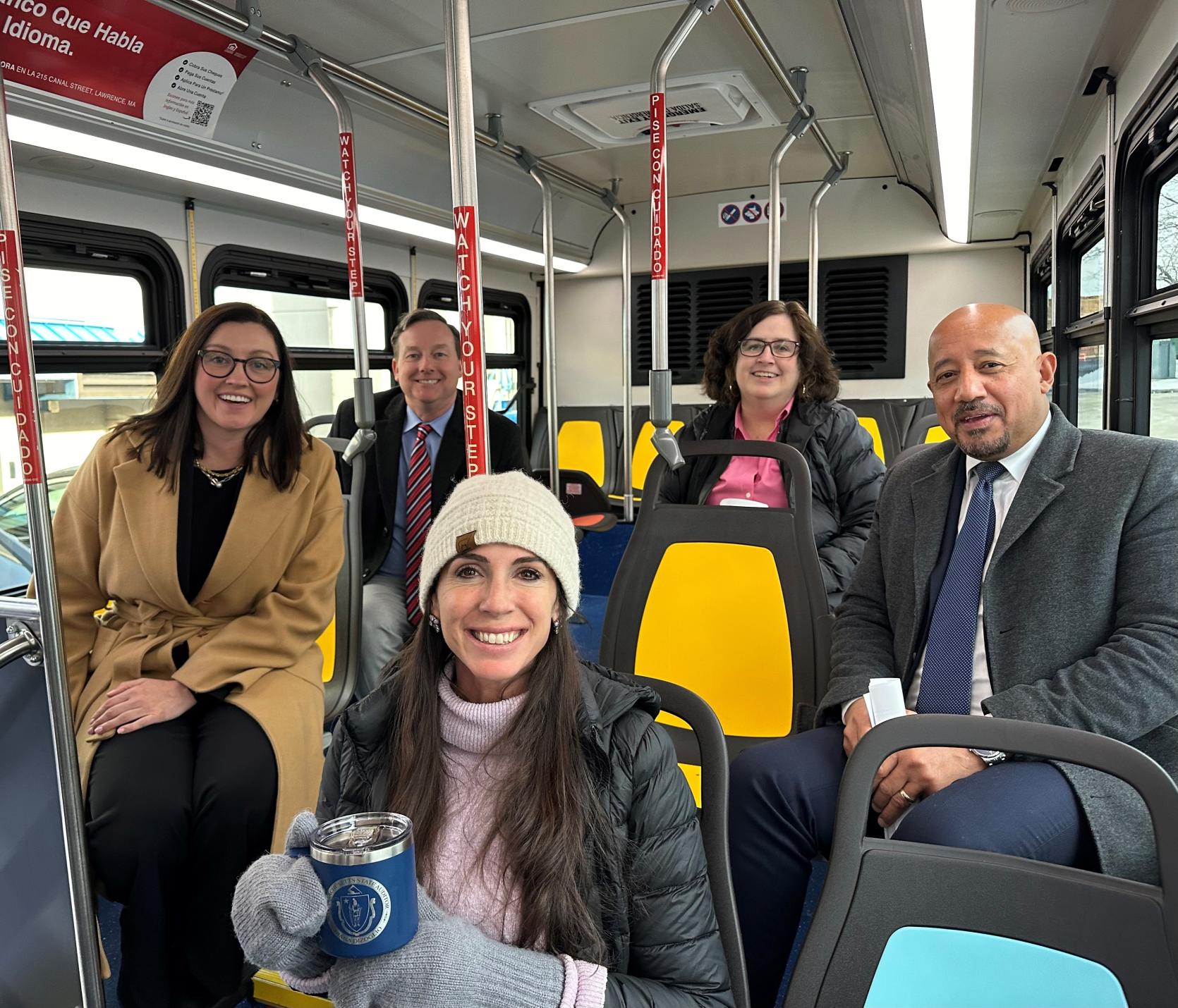 Auditor DiZoglio is pictured riding a MeVa bus with Mayors from Haverhill, Lawrence, Amesbury, and Newburyport.