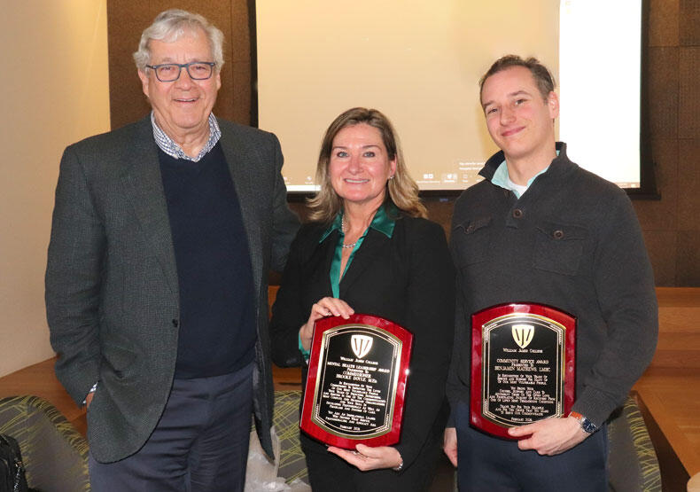 Commissioner Doyle with William James College President Nicholas Covino, and Benjamin Matthews