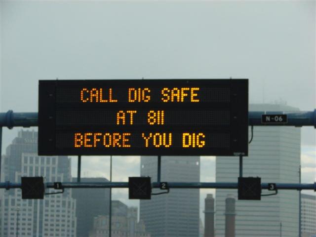 road sign displays text: Call Dig Safe at 811 Before You Dig