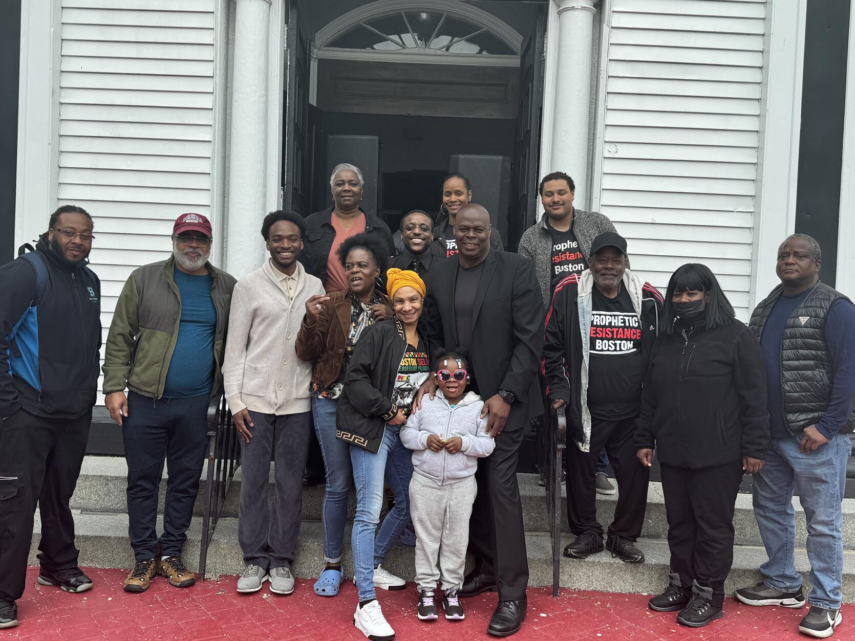 Commissioner Pamerson Ifill and members of Prophetic Resistance Boston.