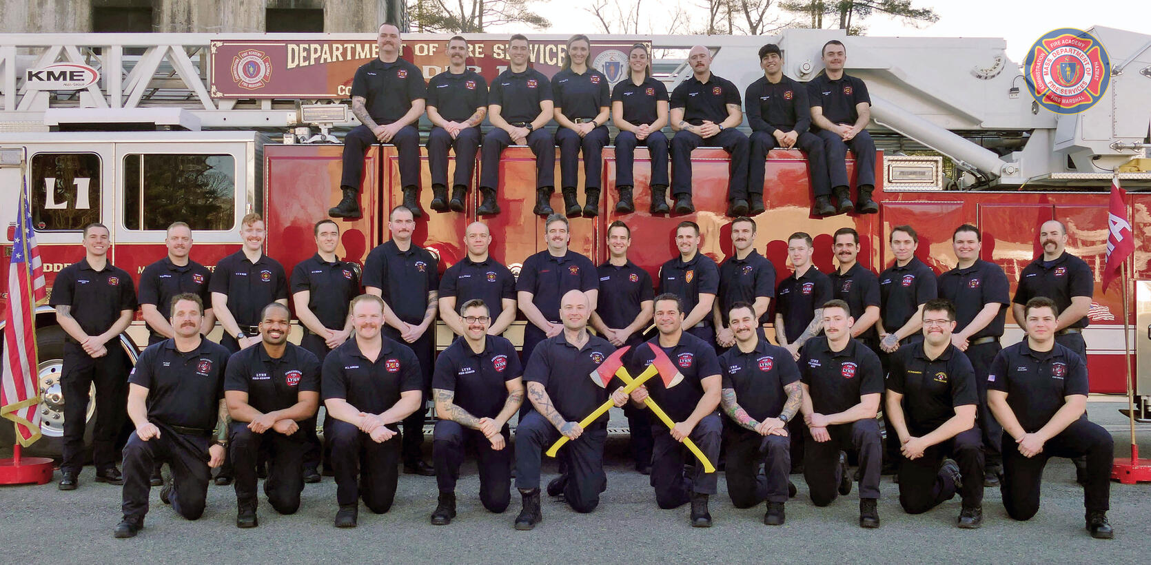 33 firefighters on and around a ladder truck