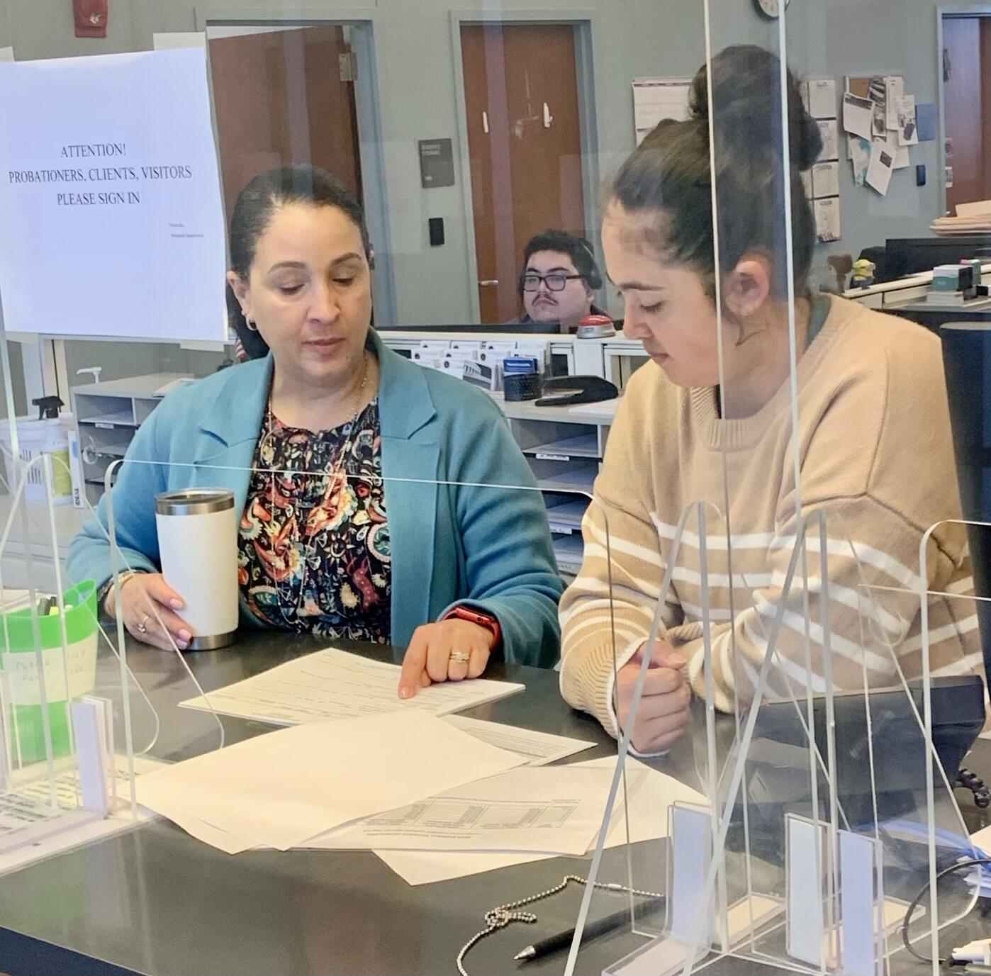 Salem District Probation Office Manager Eunice M. Sanchez and student Genevieve Roger