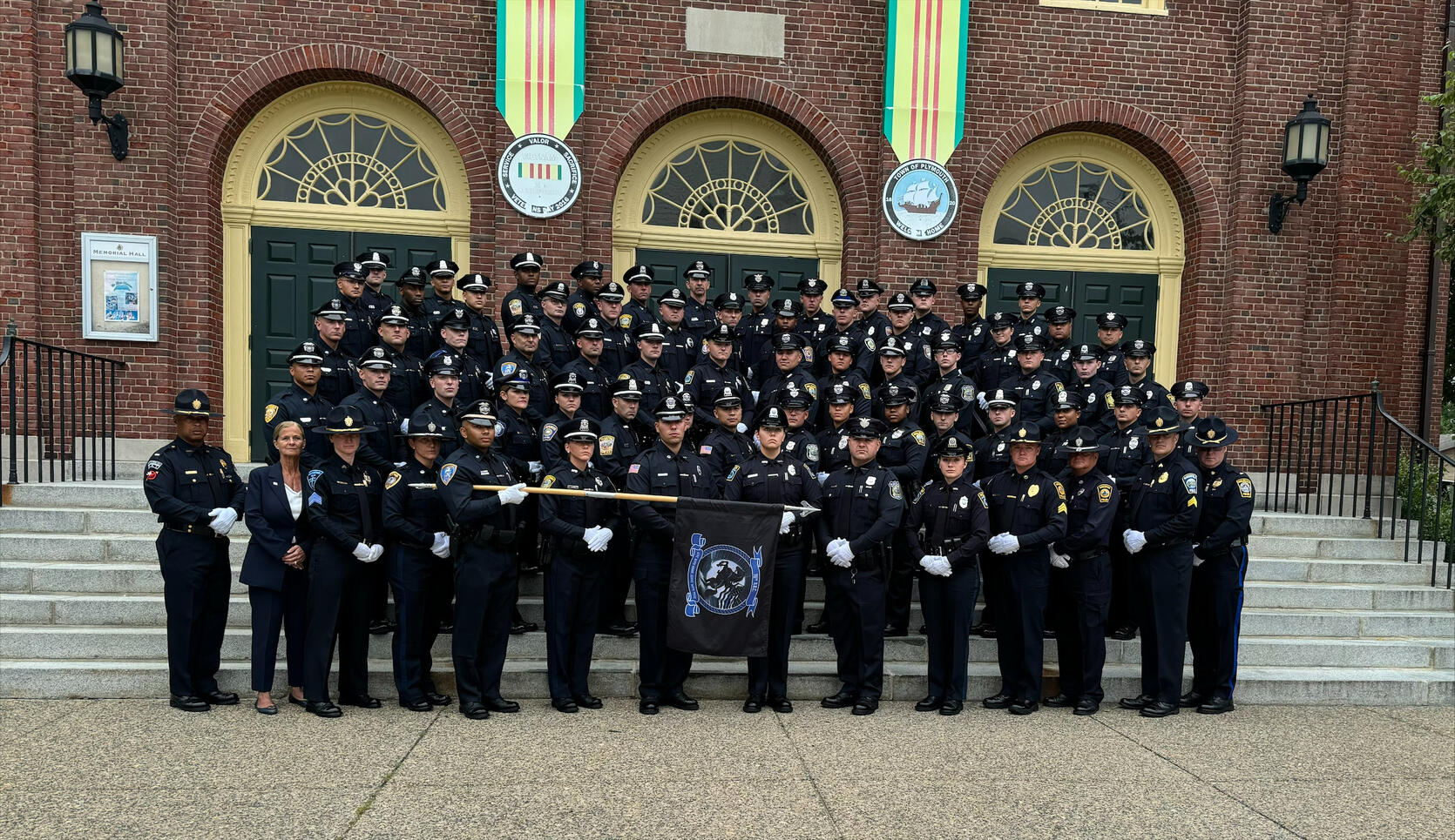 Local Police Officers Post for Graduation photo from the MPTC Plymouth Police Academy