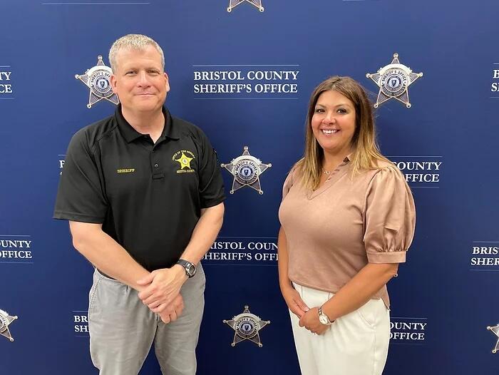 Sheriff Paul Heroux poses with a staff member