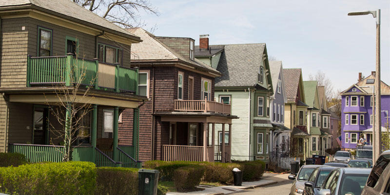 A street with mixed housing in the Boston area