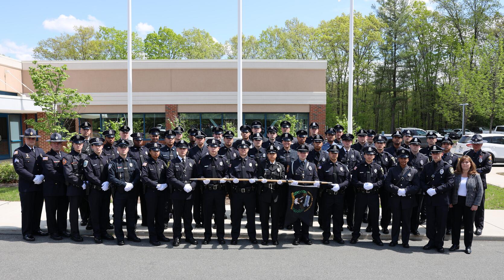 Police Officers pose for graduation picture