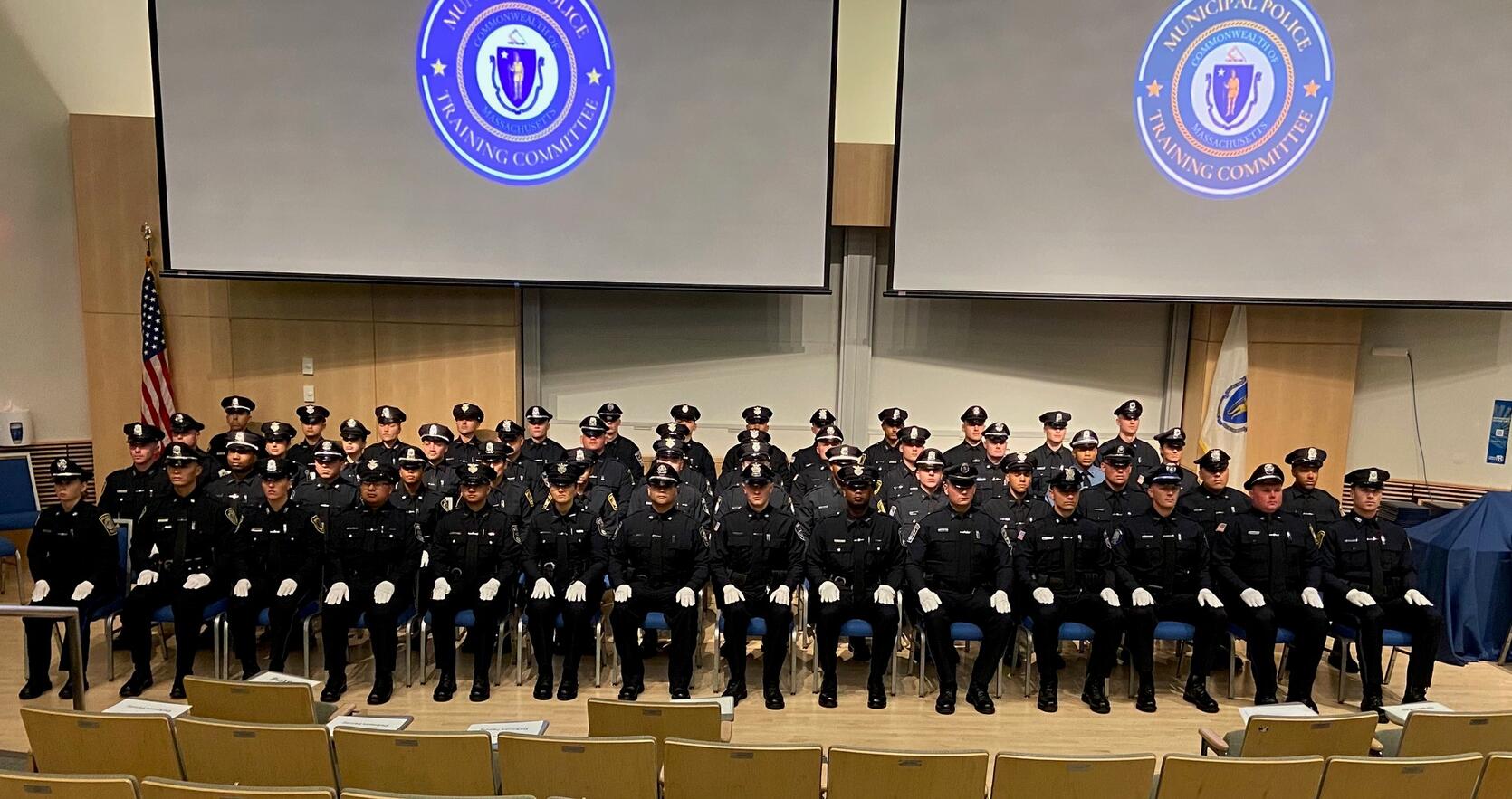 Police Officers pose for graduation picture