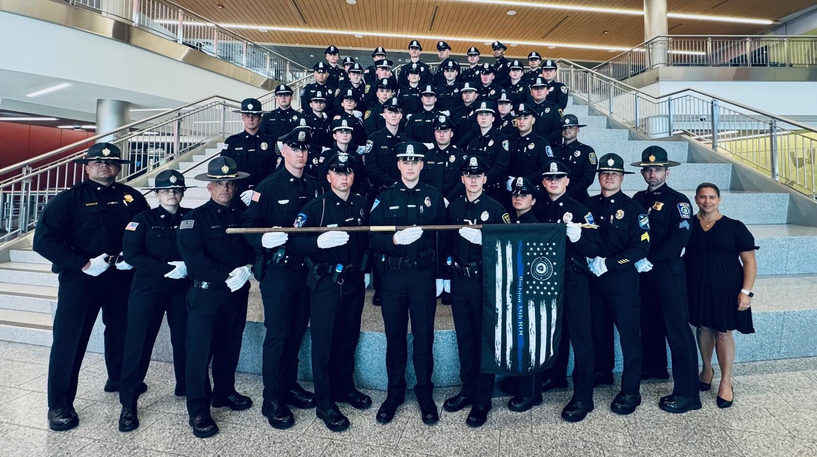 Police Officers pose for graduation picture
