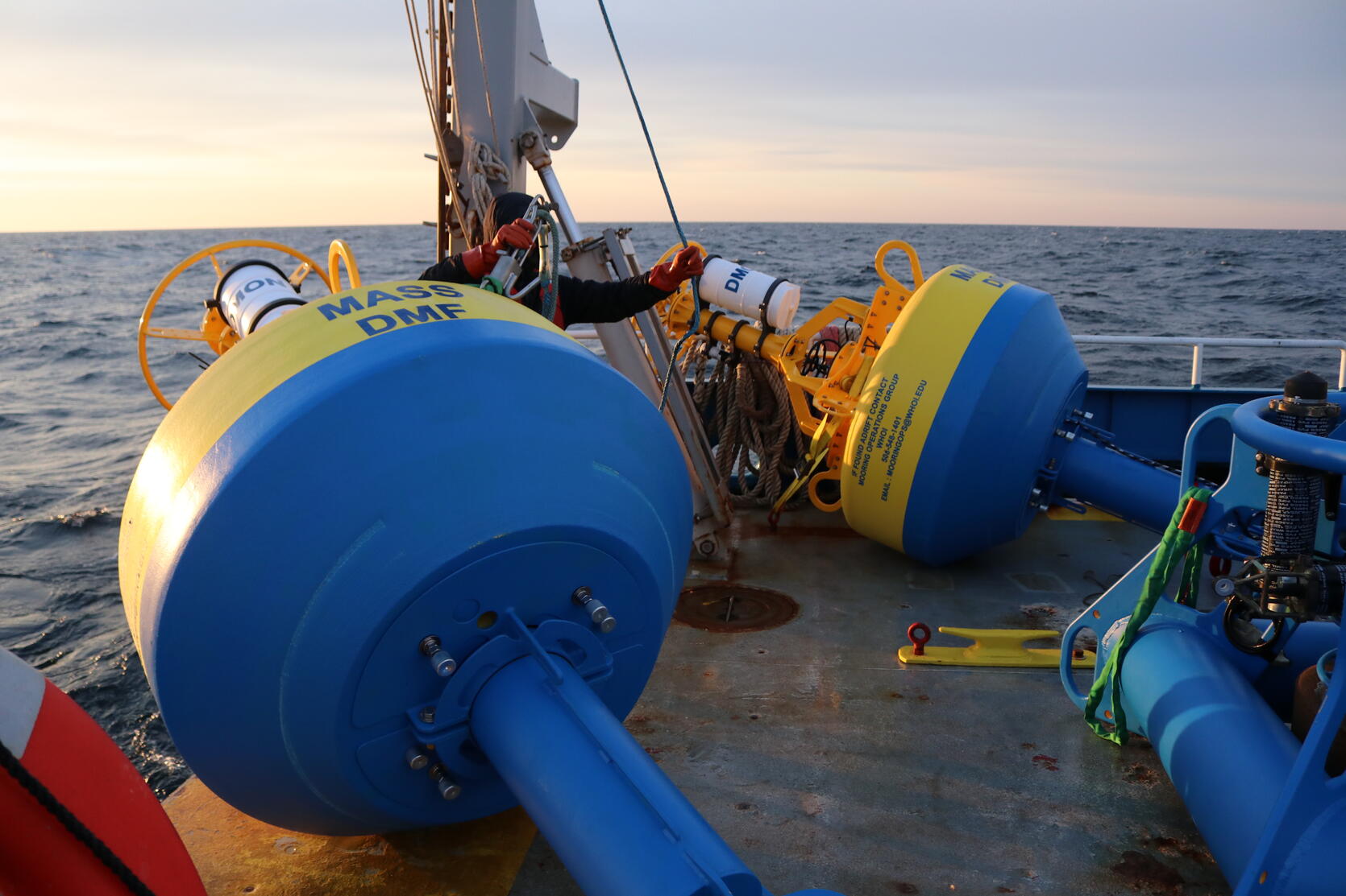Near real-time acoustic monitoring systems on the back of a boat.