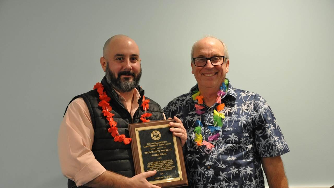 Jared Silva receiving recognition from Massachusetts Lobstermen’s Association President, Arthur (Sooky) Sawyer.