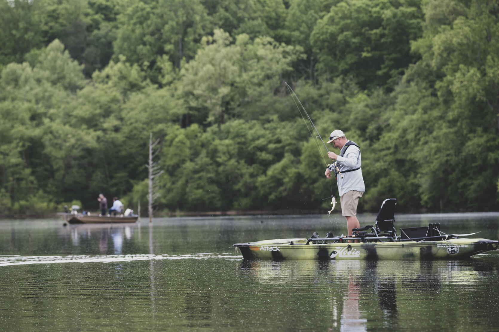 man fishing from a kayak