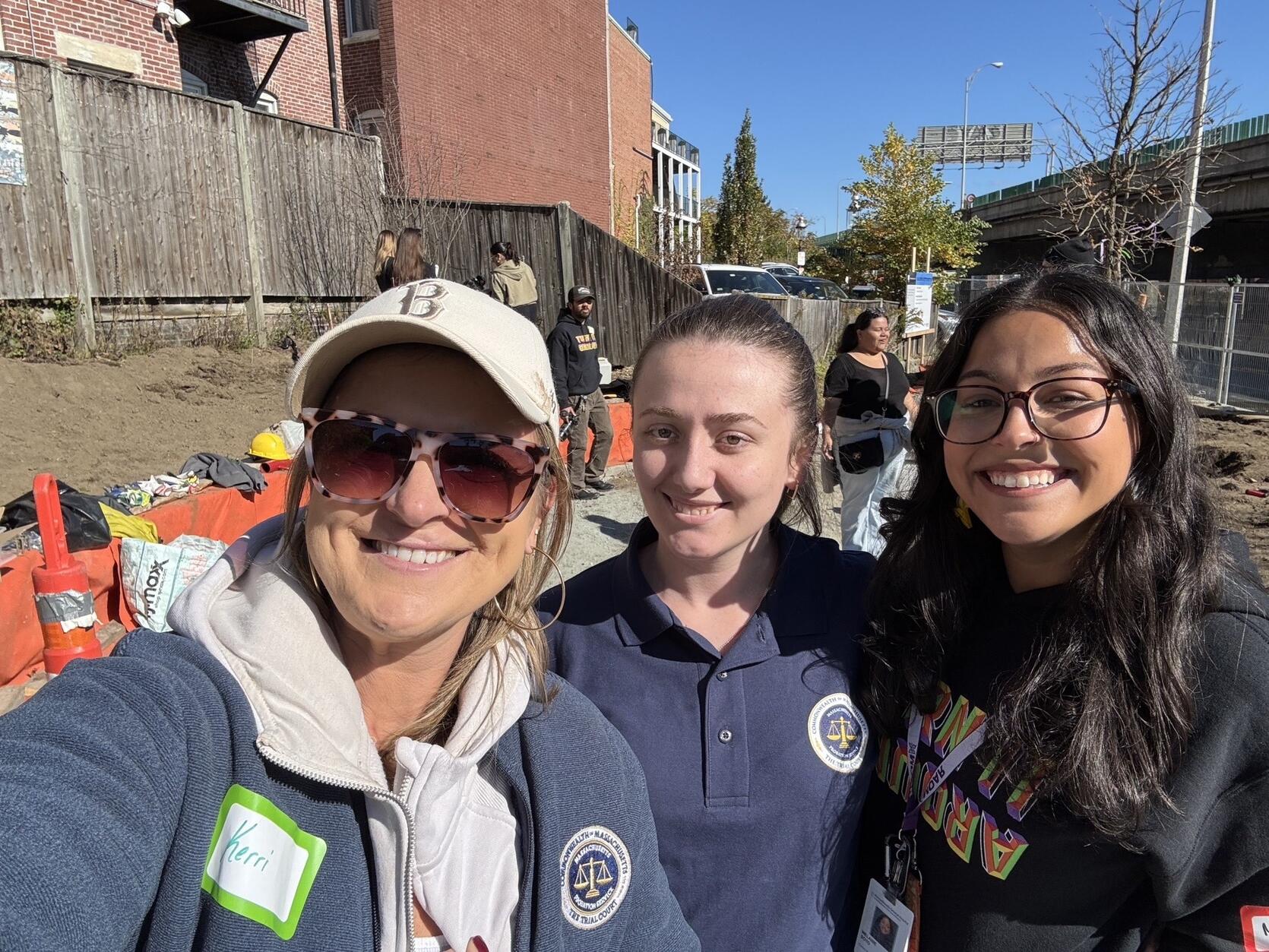 Three women pose for a selfie
