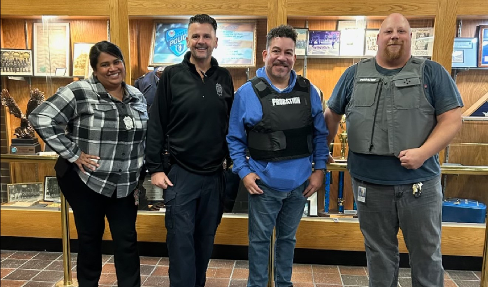 Four officers pose together