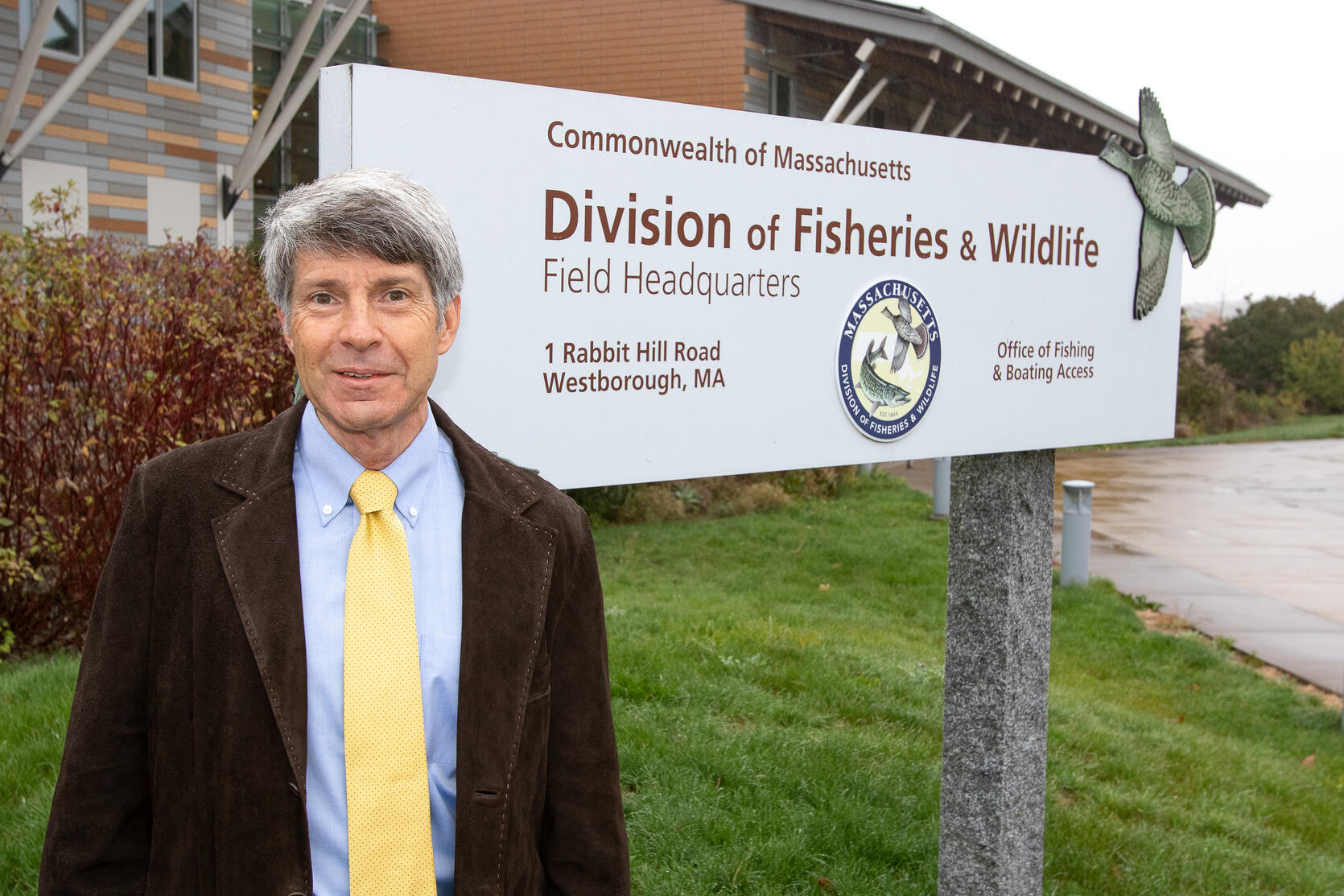 Mark Tisa in front of MassWildlife sign