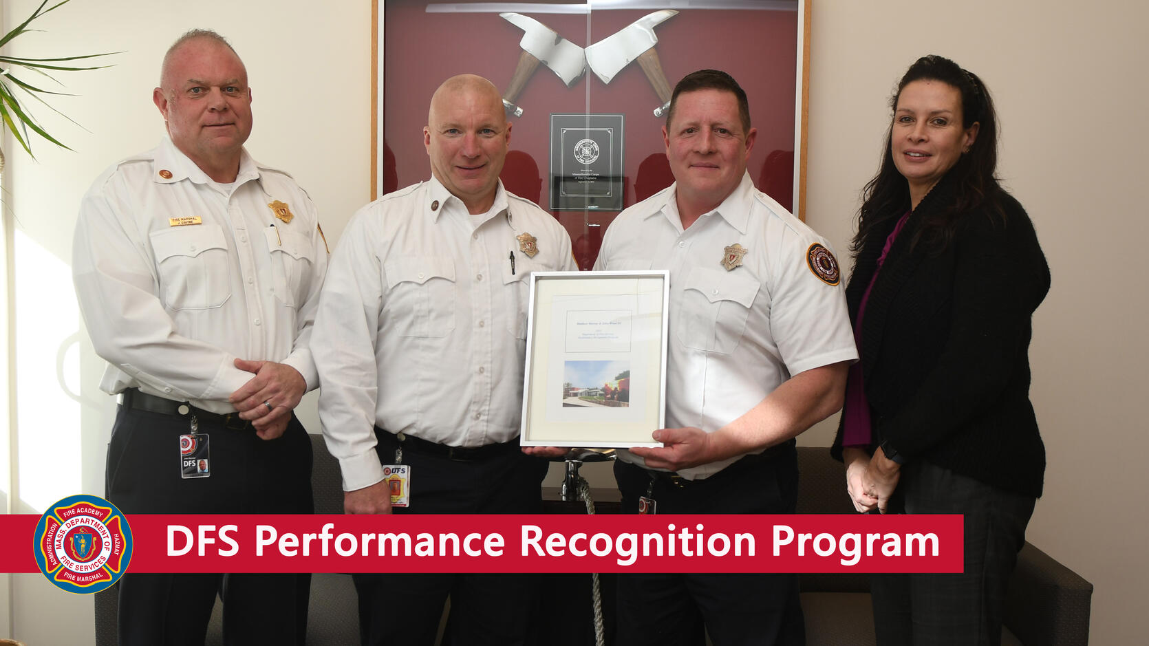 DFS staff receiving an award