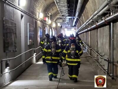 Cambridge firefighters in tunnel
