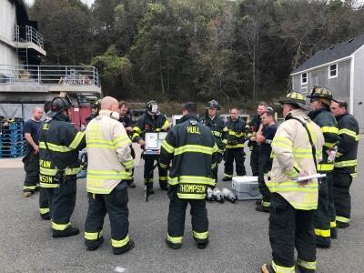 Firefighters talking in a group