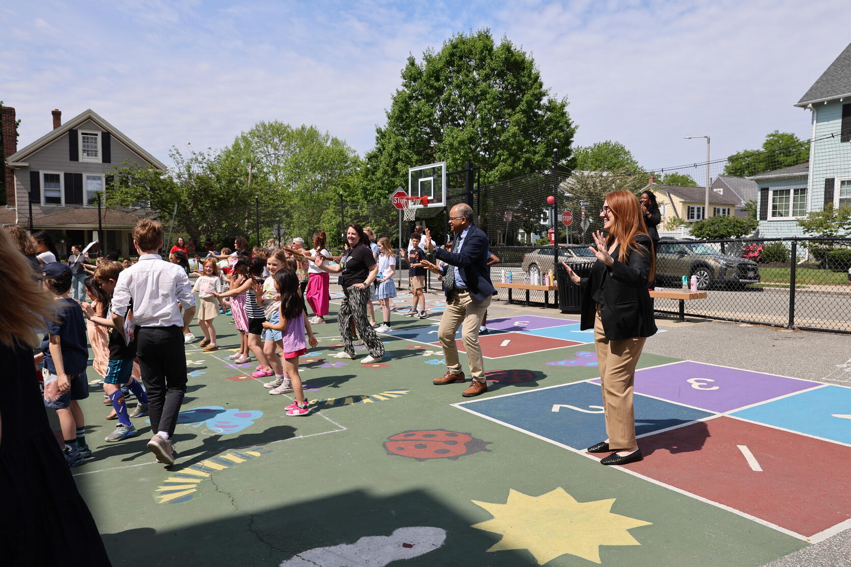 Secretary Mahaniah and Commissioner Bailey participate in Zumba with children
