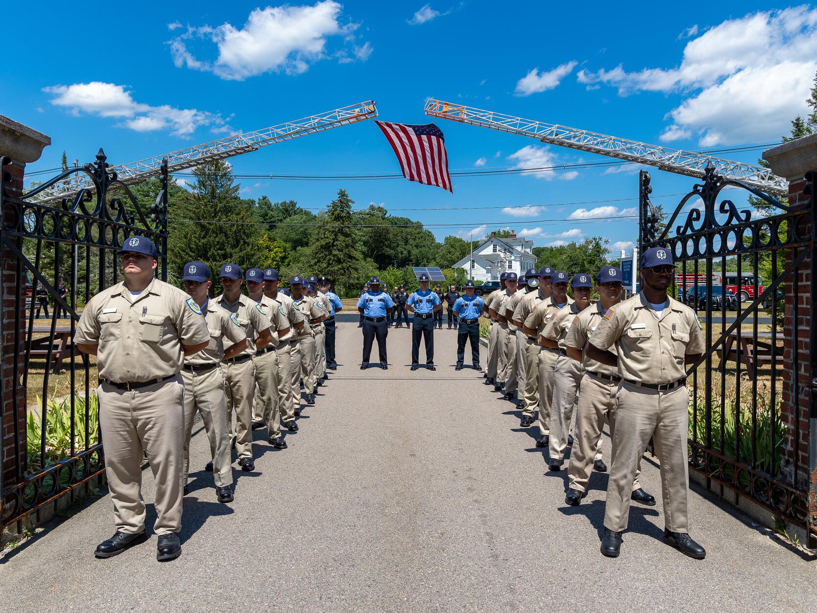 Correction officer recruits standing in formation