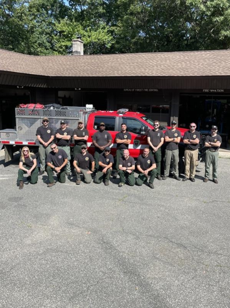The 15 Person Fire Crew Stands for a Picture Before Departure