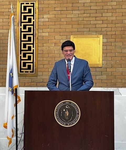 Commissioner John Oliveira delivers remarks to interns, employer partners, MCB leadership, family members, and community supporters