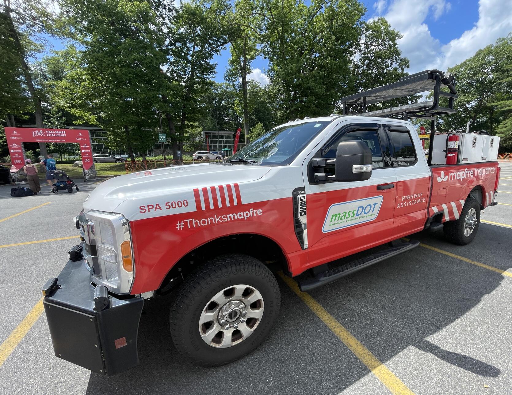 A red MassDOT Highway Assistance Program truck