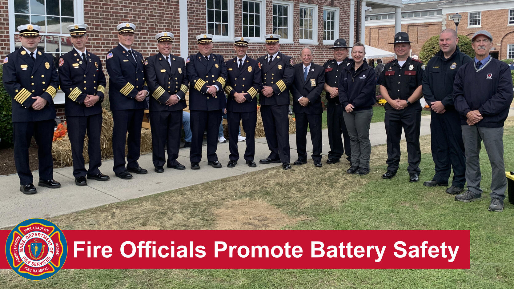 Fire chiefs and state fire marshals with the text "Fire Officials Promote Battery Safety"