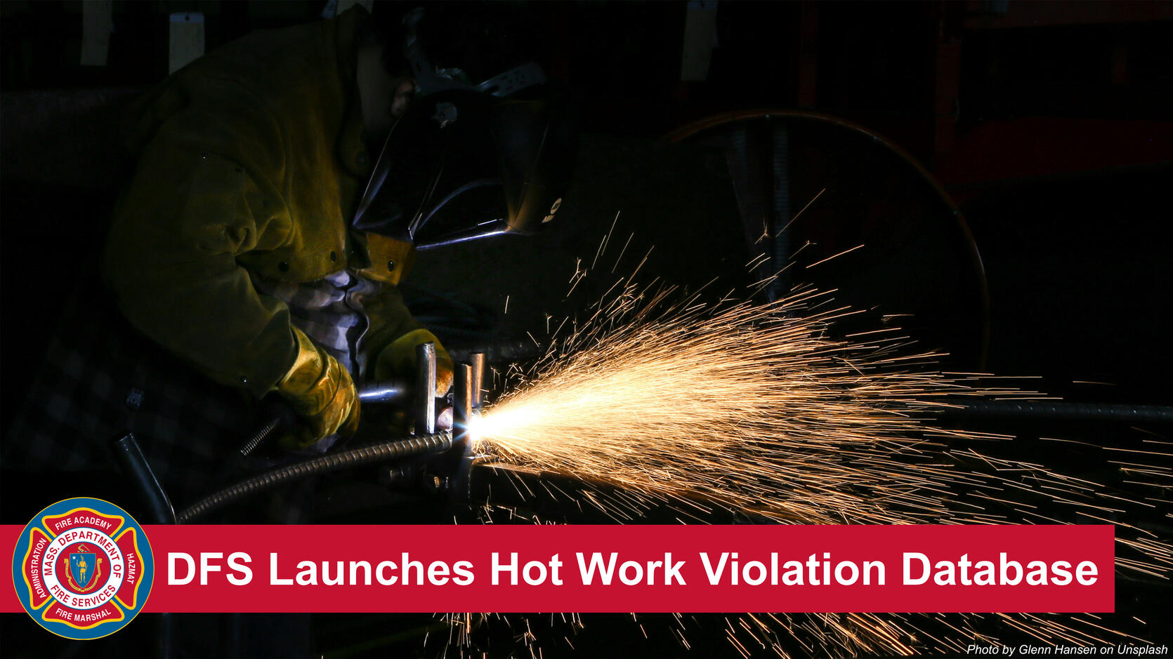 A worker creates a shower of sparks above the text "DFS launches hot work violation database"
