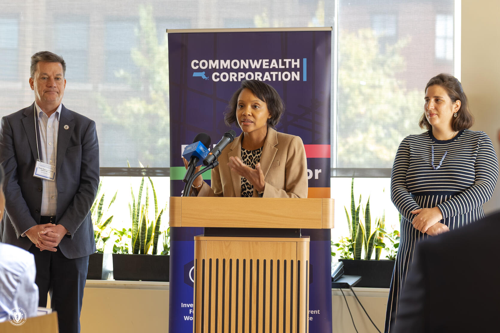 Secretary of Labor and Workforce Development Lauren Jones stands at podium