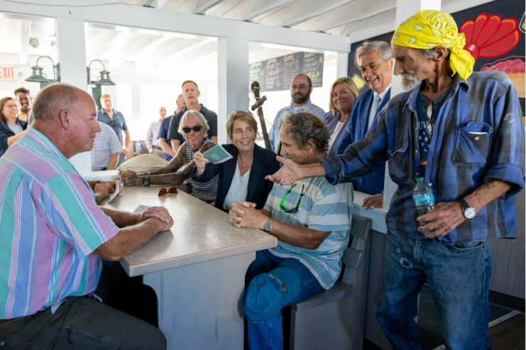 Governor meets with local harvesters and delivers checks to help support income lost during 12-day emergency closure
