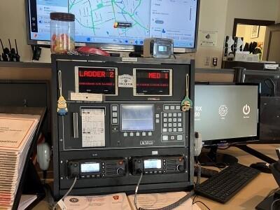 Fire alarm workstation with dispatch radio equipment