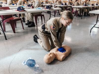 Correction Officer candidate performing CPR training