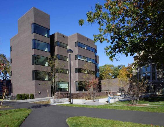 Exterior picture of a multi-story brick building.