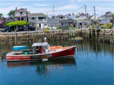 commercial fishing boat heading out of port