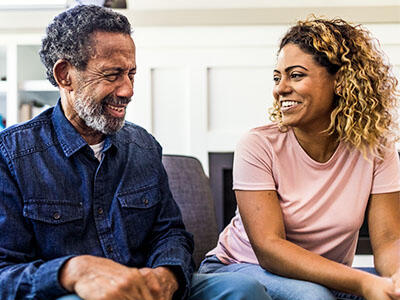 Two people smiling