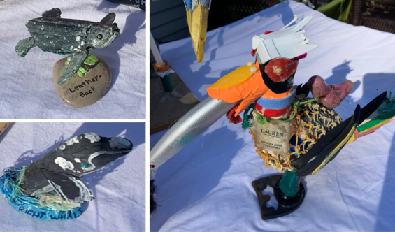 Three pieces of artwork (a leatherback sea turtle, a right whale, and a seabird) consisting of marine debris found on the beach.
