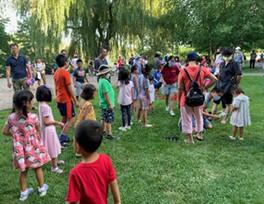 Children and families attending the Beebe School's summer program gathers at one of the vaccination sites in Malden.