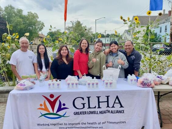 Smiling volunteers from Greater Lowell Health Alliance at a recent vaccine clinic event.