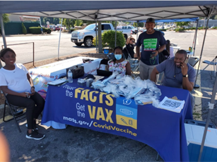 Members from Authentic Caribbean Foundation, Inc. hosting a vaccine event in Hyde Park.