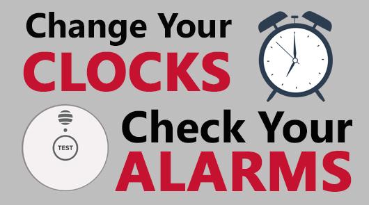 The words "Change Your Clocks, Check Your Alarms" with pictures of a clock and smoke alarm