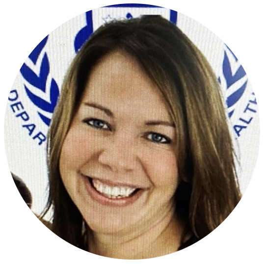 Danielle Loranger is a clinical resource nurse. She has a beautiful smile and she took her photo in front of the DPH logo.