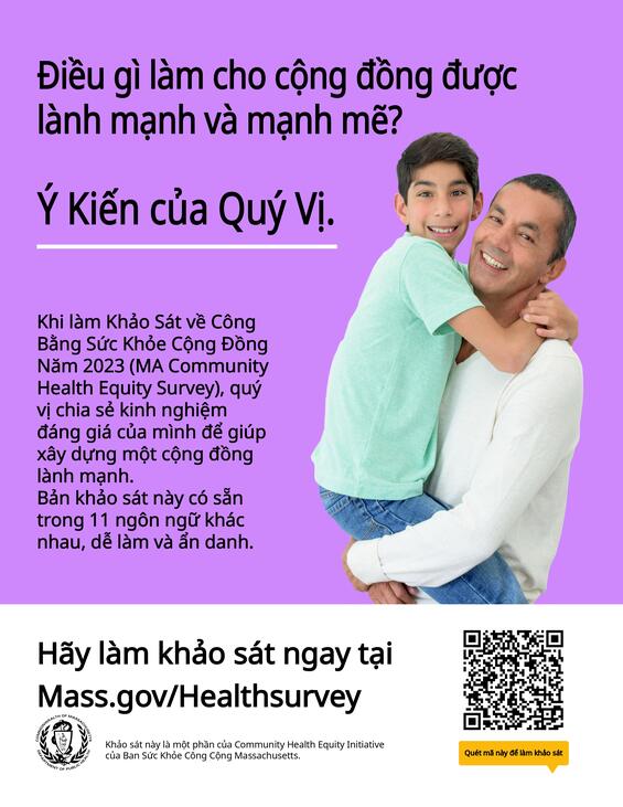 A person carrying a child  Description automatically generated
